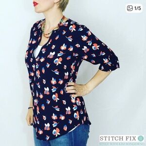 Pixley from StitchFix navy floral tulip blouse. Size medium.